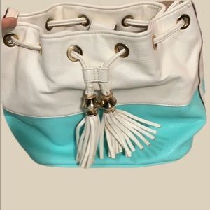 Day to evening bag, carried once.